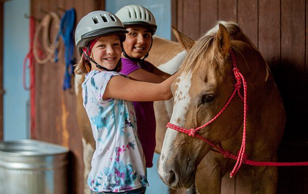 two girls with horse