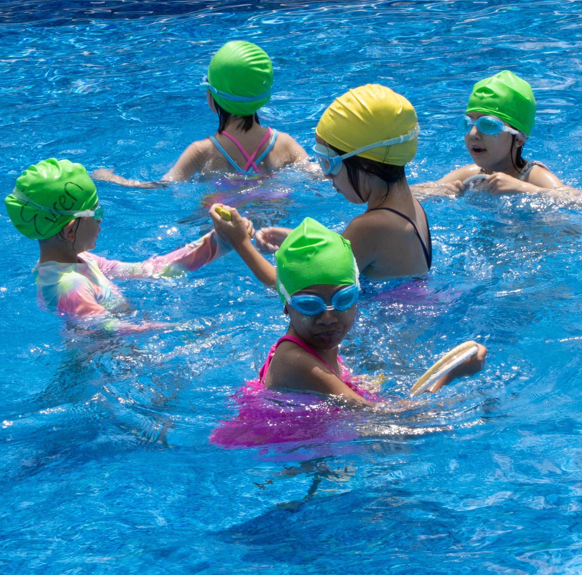 three girls roasting marshmallows 