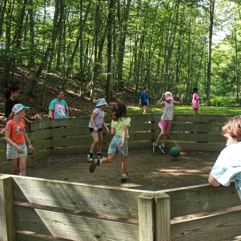 three girls roasting marshmallows 