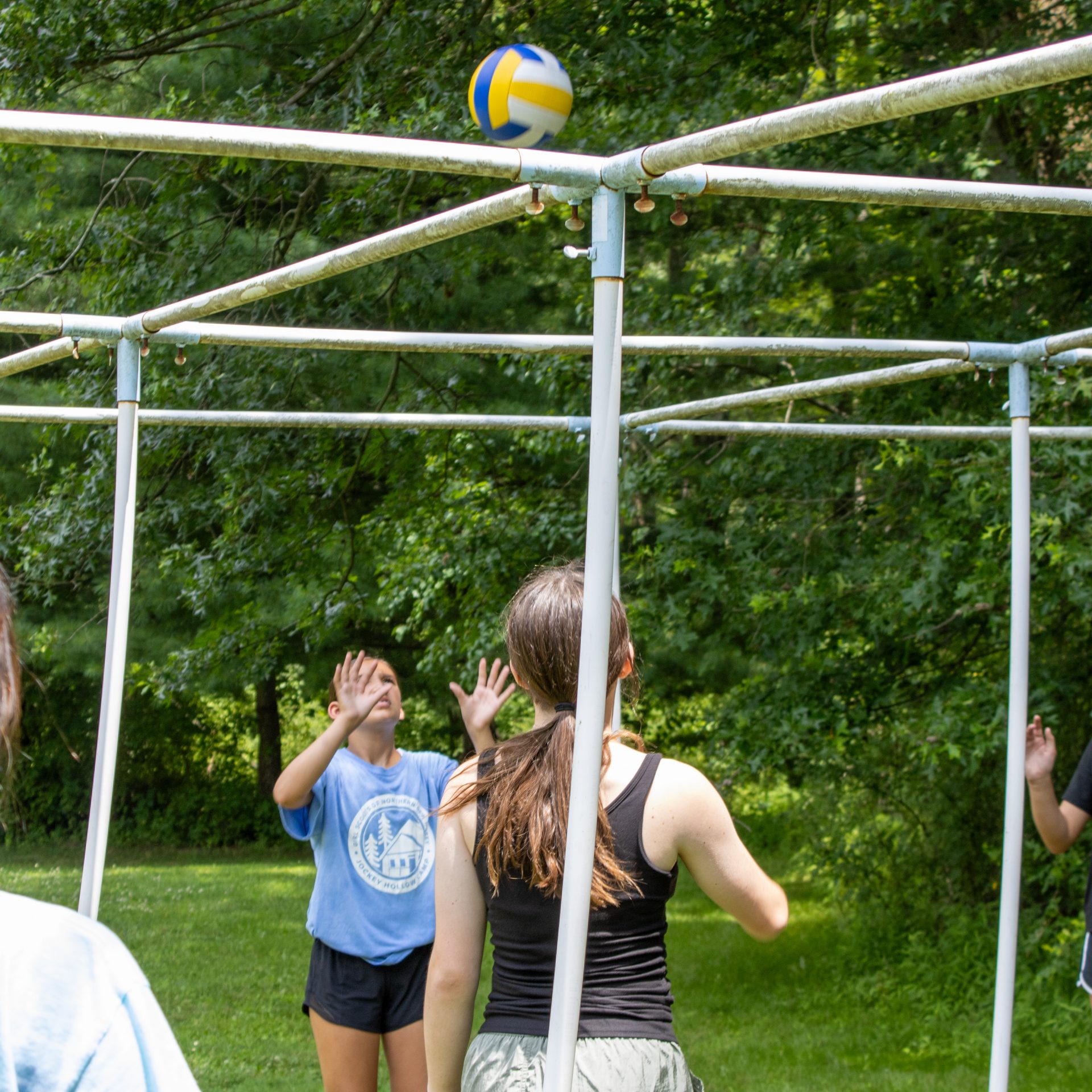 three girls roasting marshmallows 